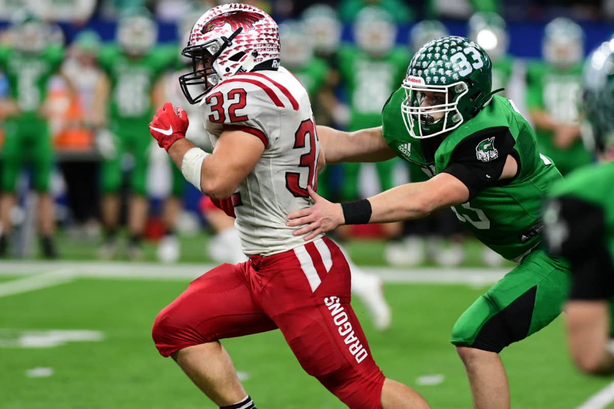 New Palestine's Charlie Spegal runs for a large gain in the fourth quarter during the IHSAA 5A State Championship against Valparaiso on Friday, Nov. 29, 2019. (Tom Russo | Daily Reporter)