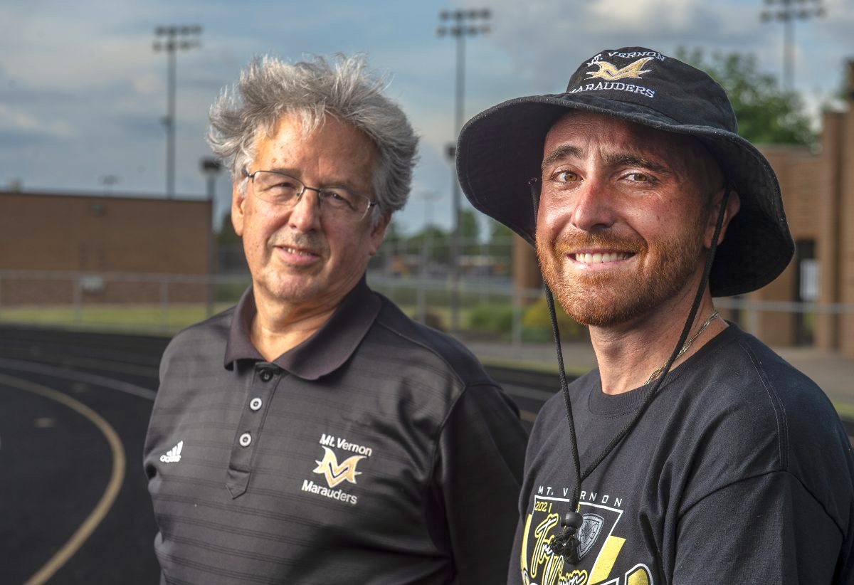 The 2021 Daily Reporter Boys and Girls Track and Field Coaches of the Year: Mt. Vernon's Bruce Kendall, left, and Kean Coy. (Tom Russo | Daily Reporter)