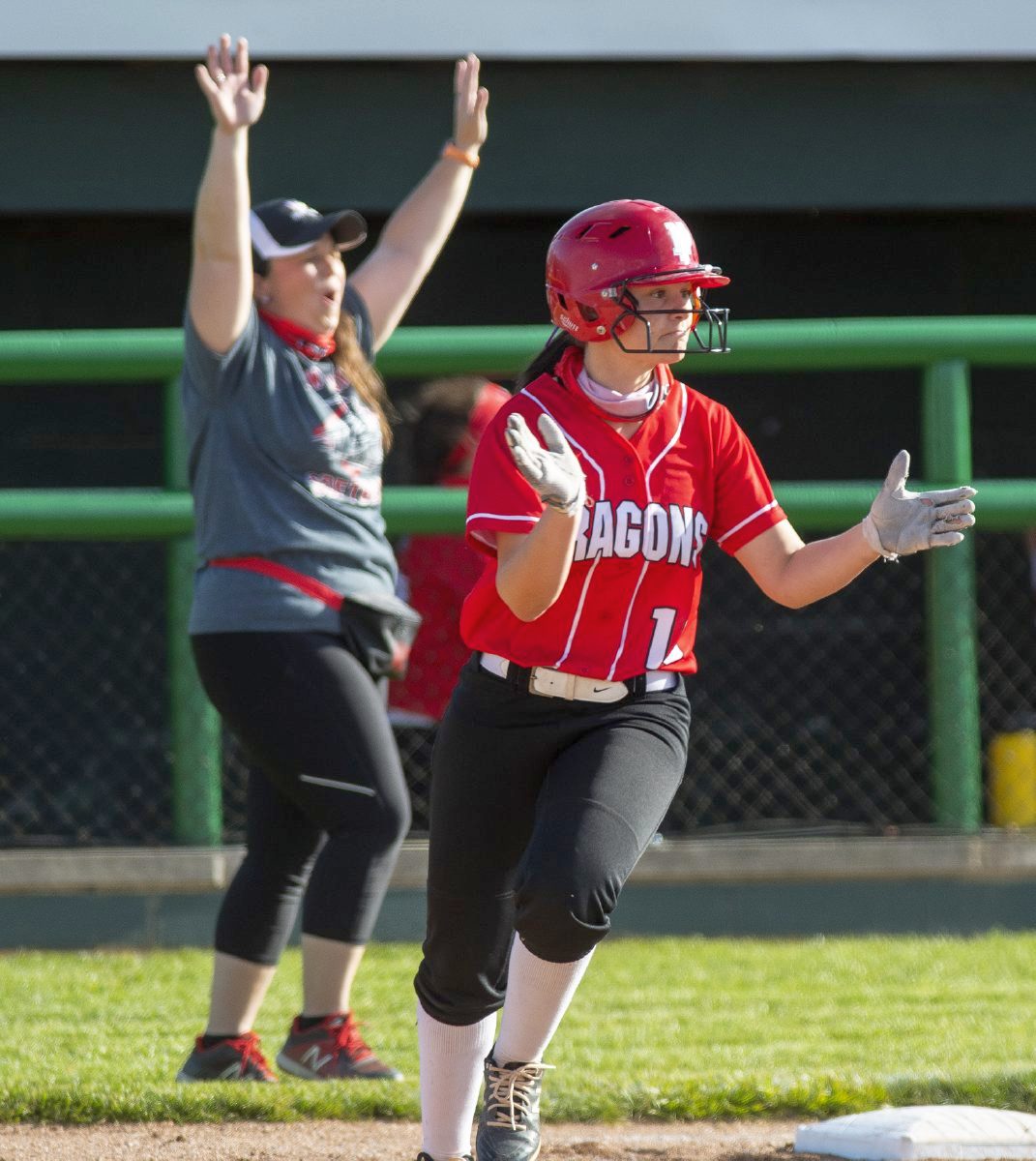 New Palestine’s Lexi Campbell rounds the bases after a home run against Pendleton Heights on Thursday, May 13, 2021. ( Tom Russo | Daily Reporter)