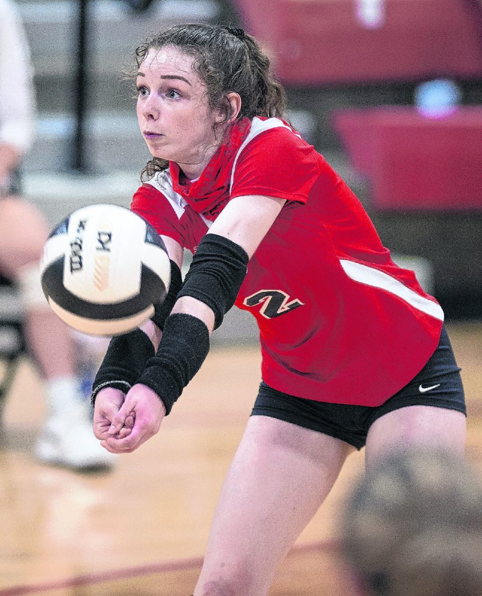 New Palestine’s Grace Myers digs a serve during their game against Centerville on Wednesday, Sept. 23, 2020. (Tom Russo | Daily Reporter)