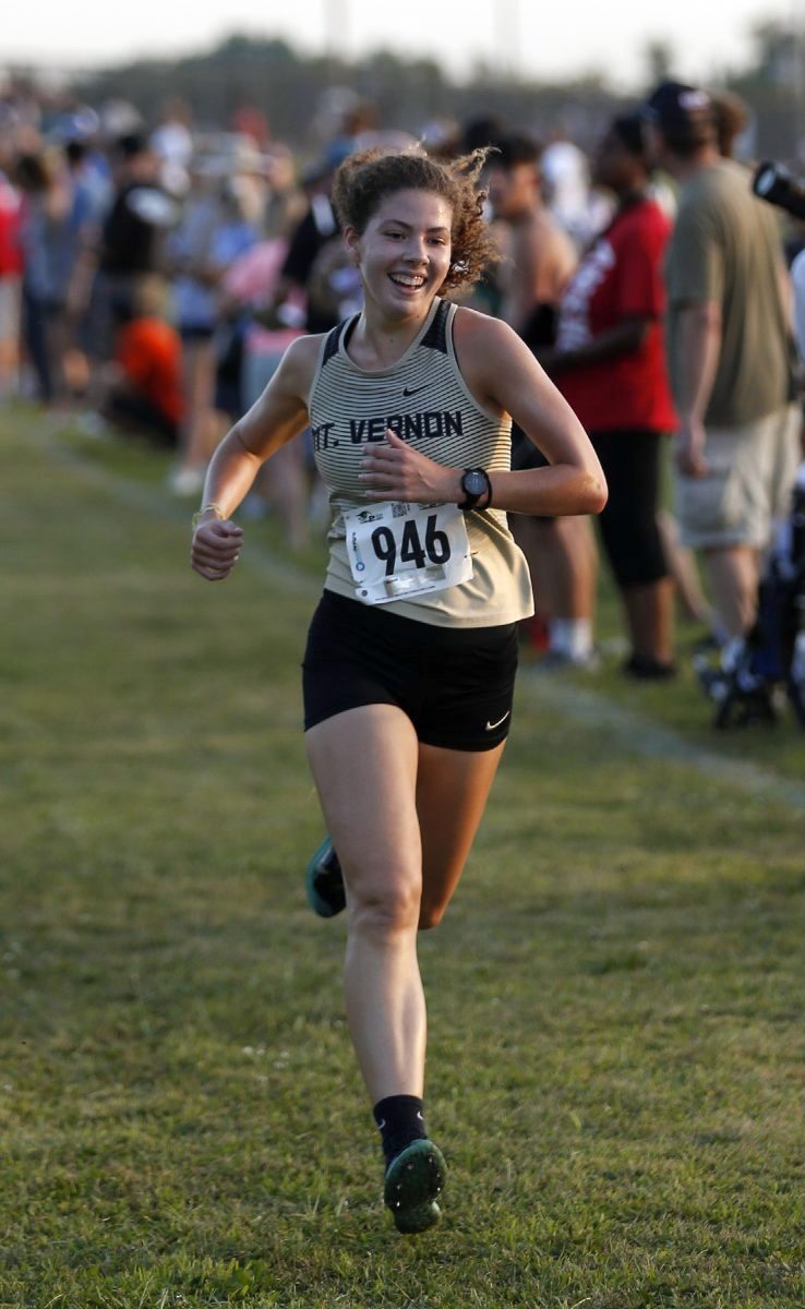 Mt. Vernon’s Morgan Tharp (946) finishes first at the Arabian Roundup cross-country meet at Pendleton Heights High School on Wednesday, Aug. 25, 2021. (Rob Baker/Daily Reporter)