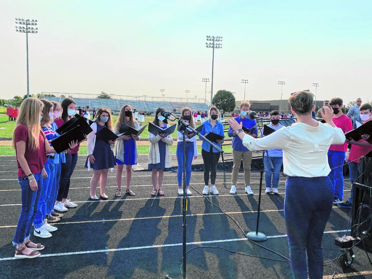 The Mt. Vernon High School choir sings "God Bless America" during a ceremony on Friday commemorating the 20th anniversary of the attacks on Sept. 11, 2001.  Stacy Muffler | Mt. Vernon Community School Corporation