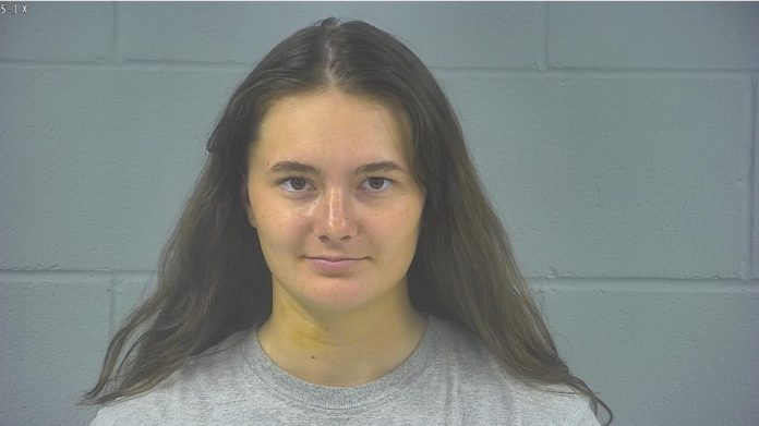 Victoria I. Perkins, 19, Greenfield, was arrested on an intimidation charge.